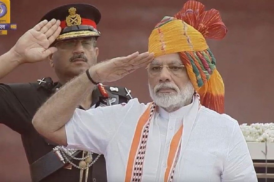 স্বাধীনতা দিবসে লালকেল্লায় প্রথা মেনে জাতীয় পতাকা উত্তোলন করলেন প্রধানমন্ত্রী নরেন্দ্র মোদি ৷ Photo- TV grab স্বাধীনতা দিবসে লালকেল্লায় প্রথা মেনে জাতীয় পতাকা উত্তোলন করলেন প্রধানমন্ত্রী নরেন্দ্র মোদি ৷ Photo- TV grab