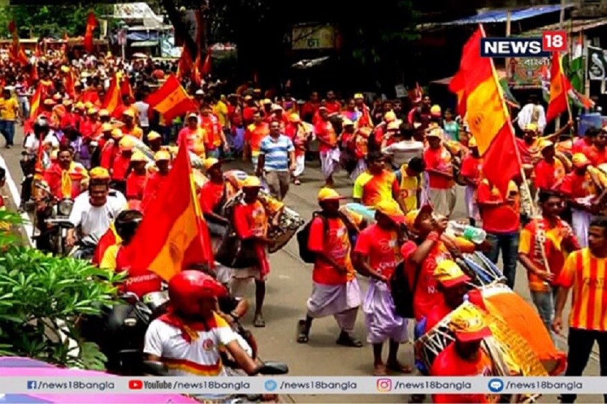 পায়ে পায়ে অনেক পথ চলা , আজ ইস্টবেঙ্গলের নামের ঐতিহ্য আরও পূর্ণতা পেয়েছে শতবর্ষ সেলিব্রেশনে ৷ সারা বাংলা থেকে লাল হলুদ ফ্যানরা মাতোয়ারা নিজেদের শতবর্ষ উদযাপনে ৷ শহরের রঙ যেন লাল হলুদ ৷ Photo- Video Grab পায়ে পায়ে অনেক পথ চলা , আজ ইস্টবেঙ্গলের নামের ঐতিহ্য আরও পূর্ণতা পেয়েছে শতবর্ষ সেলিব্রেশনে ৷ সারা বাংলা থেকে লাল হলুদ ফ্যানরা মাতোয়ারা নিজেদের শতবর্ষ উদযাপনে ৷ শহরের রঙ যেন লাল হলুদ ৷ Photo- Video Grab