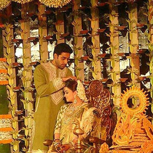 • অভিষেককে দেখা যায়, সন্তানসম্ভবা স্ত্রীর মাথার ফুল ঠিক করে দিতে ৷ ছবি: ইনস্টাগ্রাম ৷