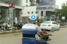 হেলমেট নেই, মাথায় পরে নিলেন ডেকচি, দেখুন ভিডিও হেলমেট নেই, মাথায় পরে নিলেন ডেকচি, দেখুন ভিডিও