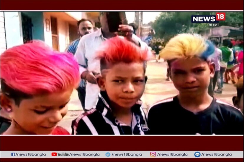ওত পেতে বসে গিরগিটি। তবে মাঠে বা গাছে নয়।  মাথায়। মোরগও ডাকছে, সেও মাথায় । রামধনু রং থেকে হরেক রকম জটা...সেটাও কারও না কারও মাথাতেই। প্রতিবারের মত এবারও হরেক চুলের ছাঁটে রঙিন সিউড়ির বামদেব ক্লাবের কালীপুজোর ভাসান।  