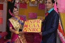 সিউড়ির নবদম্পতির হাতে NRC, NPR, CAA বিরোধী পোস্টার !