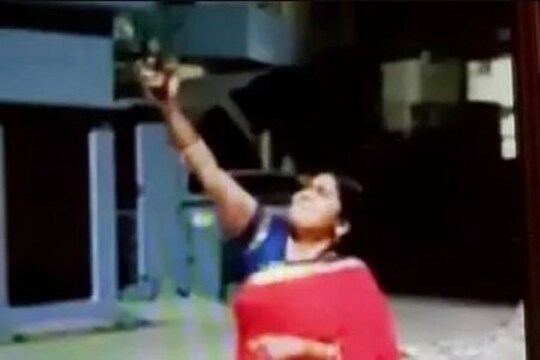 BJP Mahila Wing leader Manju Tiwari firing in the air. (Image: Video screengrab)