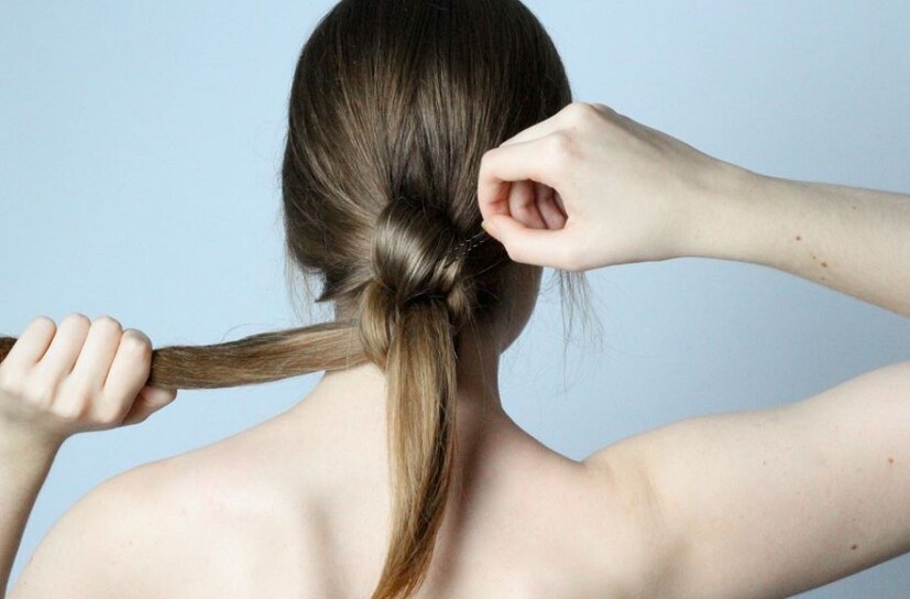 যাদের চুল লম্বা , তারা রাস্তায় বেরোনোর সময় মাথার চুল বেঁধে বেরোনো উচিত ৷ Photo- Representive