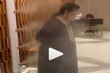 স্প্রে হচ্ছে স্যানিটাইজার, মেশিনের সামনে সারা শরীর স্যানিটাইজ করছেন করণের মা !