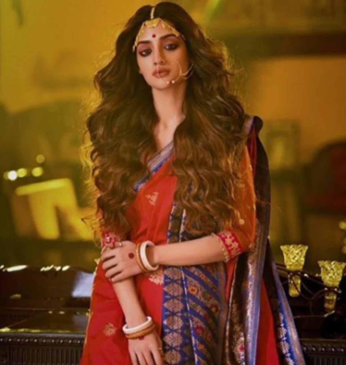 তিনি ইসলাম ধর্মাবলম্বী হওয়া সত্ত্বেও কী করে এভাবে হিন্দু দেবী সাজতে পারেন তা নিয়ে চোথ রাঙিয়েছিলেন প্রচুর ধর্মের ধ্বজাধারীরা৷ তাঁকে অনেকরকমের নক্কারজনক হুমকিও দেওয়া হয়৷ Photo-Nusrat Jahan/ Instagram তিনি ইসলাম ধর্মাবলম্বী হওয়া সত্ত্বেও কী করে এভাবে হিন্দু দেবী সাজতে পারেন তা নিয়ে চোথ রাঙিয়েছিলেন প্রচুর ধর্মের ধ্বজাধারীরা৷ তাঁকে অনেকরকমের নক্কারজনক হুমকিও দেওয়া হয়৷ Photo-Nusrat Jahan/ Instagram