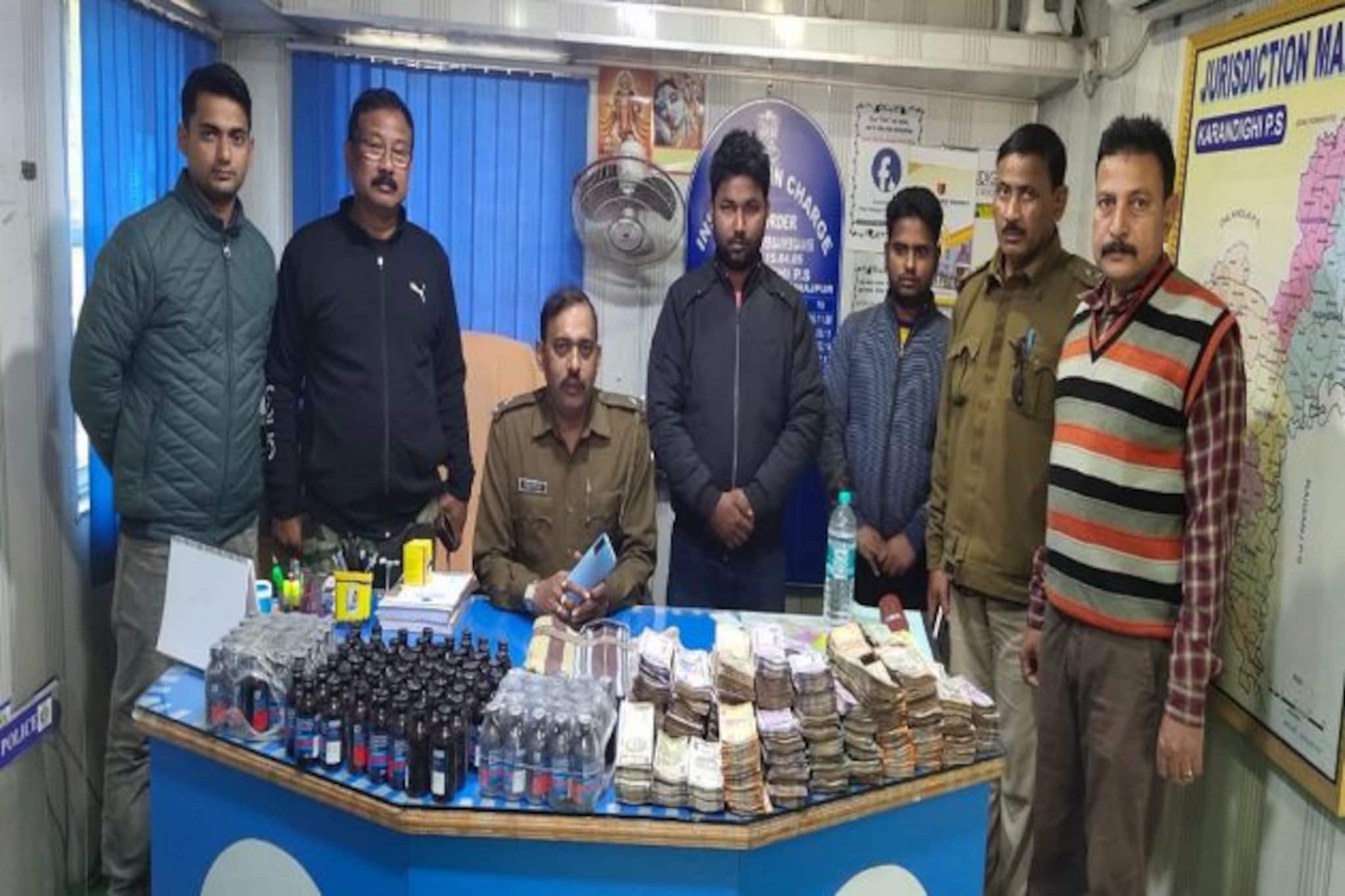 বিপুল পরিমান নগদ টাকা-সহ কাশির ওষুধ উদ্ধার ! গ্রেফতার দুই