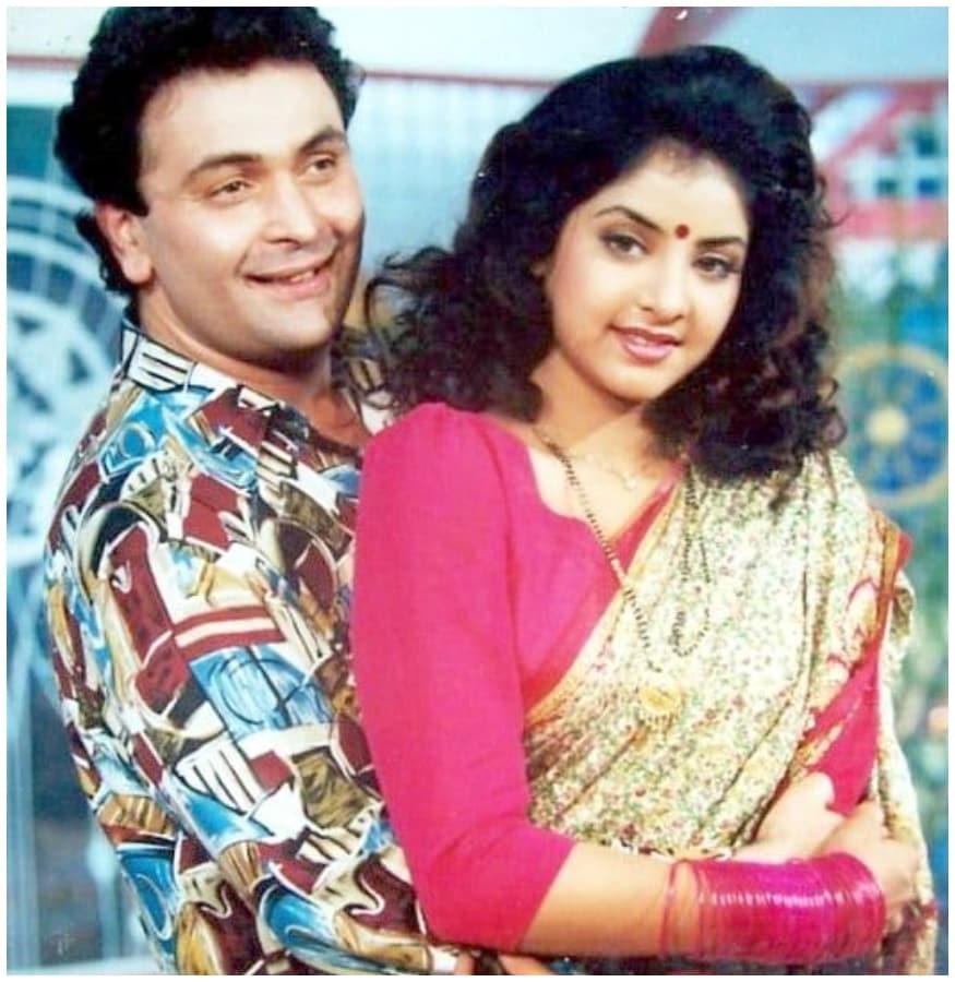 দিওয়ানা (১৯৯২): ঋষি কাপুর ও শাহরুখ খানের সঙ্গে দিওয়ানা ছবিটি বক্স অফিসে সুপারহিট হয়েছিল ৷ 'তেরি উম্মিদ তেরা ইন্তেজার করতে হ্যায়' মন ছুঁয়ে যাওয়া গানটি সেই সময়ে ঝড় তুলেছিল সোশ্যাল মিডিয়ায় ৷ ফাইল ছবি ৷ দিওয়ানা (১৯৯২): ঋষি কাপুর ও শাহরুখ খানের সঙ্গে দিওয়ানা ছবিটি বক্স অফিসে সুপারহিট হয়েছিল ৷ 'তেরি উম্মিদ তেরা ইন্তেজার করতে হ্যায়' মন ছুঁয়ে যাওয়া গানটি সেই সময়ে ঝড় তুলেছিল সোশ্যাল মিডিয়ায় ৷ ফাইল ছবি ৷