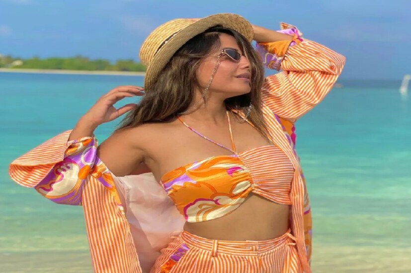 ফ্লার্টি টপ ও বিকিনিতে বাজার গরম করেছেন একই সঙ্গে প্যান্টস্যুটে তোলপাড় করেছেন হিনা খান (Hina Khan) সোশ্যাল মিডিয়ায় ৷ ছবি সৌজন্যে Instagram.