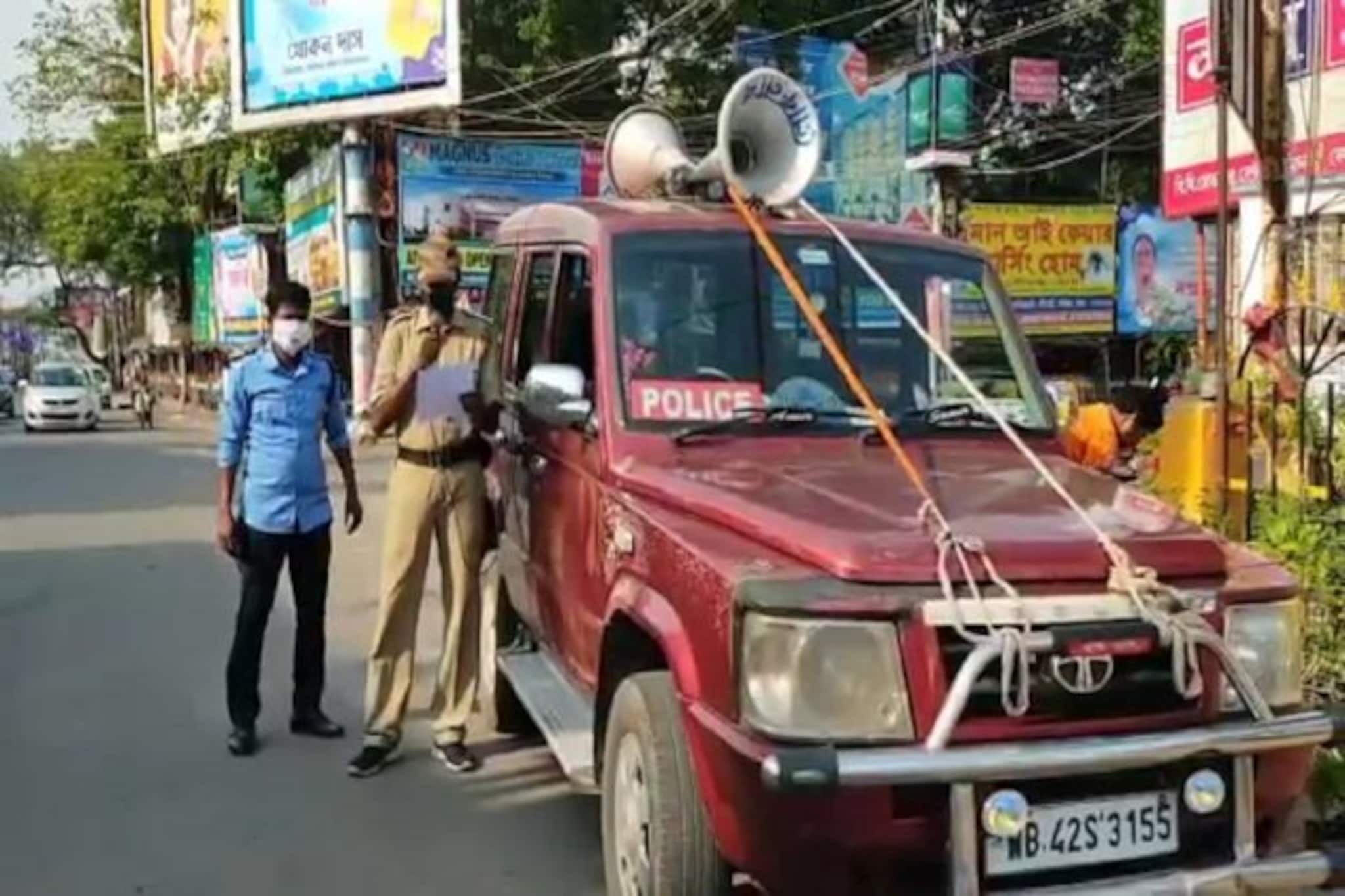 করোনা রুখতে কড়া বিধিনিষেধ, বর্ধমানে মাইক হাতে প্রচার পুলিশের