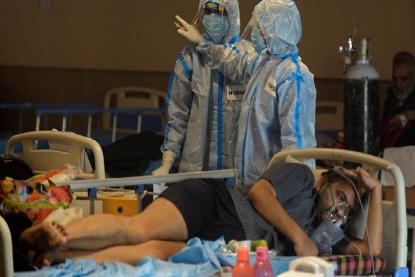 *প্রসঙ্গত, সারা দেশের করোনা আক্রান্তের সংখ্যা নিম্নমুখী। তবে এখনও দুশ্চিন্তা কাটেনি প্রশাসনের। বহু দিন পর গত ২৪ ঘণ্টায় দেশে করোনা আক্রান্তের সংখ্যা দেড় লাখের নিচে নেমেছে। ফাইল ছবি। 