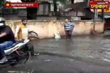 নর্দমার জল উপচে পড়ছে রাস্তায়