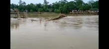 ঘাটালের মনসুকাতে জলের তোড়ে ভেঙে পড়ল ঝুমি নদীর ওপর বাঁশের সাঁকো ঘাটালের মনসুকাতে জলের তোড়ে ভেঙে পড়ল ঝুমি নদীর ওপর বাঁশের সাঁকো
