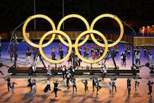 Tokyo Olympics Opening Ceremony: আকাশে অলিম্পিক রিং আঁকল ফাইটার জেট, স্টেডিয়ামে আতশবাজির আলো Tokyo Olympics Opening Ceremony: আকাশে অলিম্পিক রিং আঁকল ফাইটার জেট, স্টেডিয়ামে আতশবাজির আলো