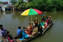 Amta Flood: বন্যার জলে ভাসছে আমতা! নৌকায় গেল বরযাত্রী, নববধূও সওয়ার নৌকাতেই Amta Flood: বন্যার জলে ভাসছে আমতা! নৌকায় গেল বরযাত্রী, নববধূও সওয়ার নৌকাতেই