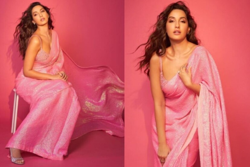 বলিউডের (bollywood) লাস্যময়ী সুন্দরী  নোরা ফতেহি  (Nora Fatehi)  নিজের  গ্ল্যামারাস লুকের জন্য সকলের খুব মনের কাছের৷ এই মুহূর্তে তাঁর নতুন সিনেমা ভূজ দ্য প্রাইড অফ ইন্ডিয়া নিয়ে তিনি চর্চায় আছেন৷ তবে এবার আগুন ধরালেন  শাড়িতে সুপার সেক্সি অবতারে৷ (Instagram @norafatehi)