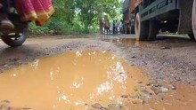 ওভারলোড লরি চলাচল করায় গোপগড়়-গুড়গুড়িপাল রাস্তার বেহাল দশা