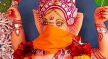 করোনা আবহে সিদ্ধিদাতা গণেশের মুখে মাস্ক পরিয়ে পুজো সিউড়িতে