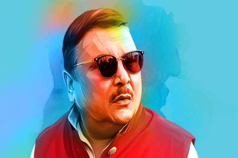 রাজনীতির ময়দানে রং ছড়িয়েছেন তিনি। প্রতিদিনই তাঁর নিত্য নতুন লাইভ আর নতুন নতুন কীর্তিতে ইতিমধ্যেই জনপ্রিয়তার প্রায় শিখরে বিরাজ করছেন কামারহাটির তৃণমূল বিধায়ক মদন মিত্র (Madan Mitra)। এবার বড়পর্দায় আসতে চলেছে মদন মিত্রের বায়োপিক ( Madan Mitra Biopic)। রাজনীতির ‘সুপারস্টার’ বলে যাঁর খ্যাতি চারদিকে, তাঁর রঙিন মেজাজ এবার ধরা পড়বে সিনেমার পর্দায়। Photo : Collected