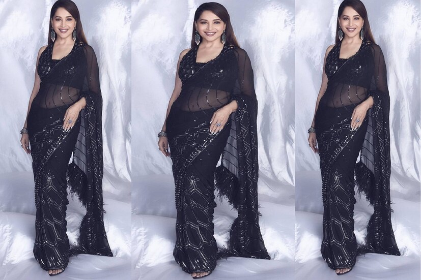 কালো সি থ্রু শাড়িতে মাধুরী ঝড় (Madhuri Dixit Storm) সোশ্যাল মিডিয়া তোলপাড় করেছে ৷ মুহূর্তেই ভাইরাল (Madhuri Dixit viral photos) হয়েছে সোশ্যাল মিডিয়ায় ৷ ছবি সৌজন্যে ইনস্টাগ্রাম ৷