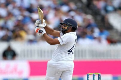 watch rohit sharma gets his maiden away test century with a six virat kohli reacts- Photo Courtesy- Twitter watch rohit sharma gets his maiden away test century with a six virat kohli reacts- Photo Courtesy- Twitter