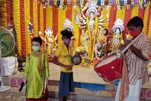 কাঁসর হাতে ছোট্ট রঘুনাথ! পুজোর শেষবেলা থেকেই অপেক্ষা শুরু হয়ে যায় ঢাকিদের কাঁসর হাতে ছোট্ট রঘুনাথ! পুজোর শেষবেলা থেকেই অপেক্ষা শুরু হয়ে যায় ঢাকিদের