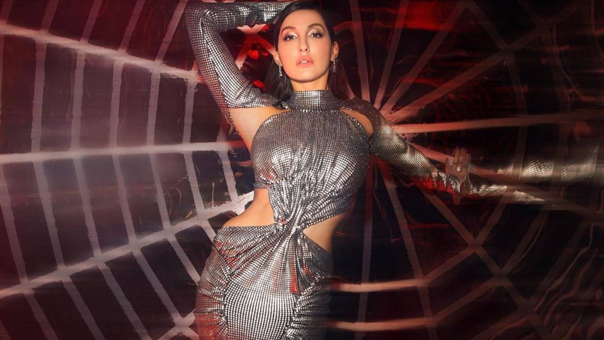 Nora Fatehi: নোরার আওয়ারগ্লাস ফিগার স্পষ্ট সিলভার কা‌ট ড্রেসে!মুহূর্তে সোশ্যালে পারদ চড়াচ্ছেন অভিনেত্রী