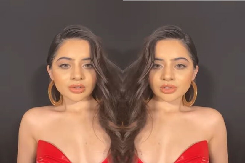 ভিডিওটিতে লাইক ও শেয়ারের বন্যা বয়ে গিয়েছে ৷ ভিডিওতে দেথে পাওয়া গিয়েছে একটি গানের সঙ্গে লিপসিঙ্ক করছেন উর্ফি জাভেদ (Urfi Javed) ৷ লাল পোশাকে সুপার হট দেখতে লেগেছে উর্ফি জাভেদকে ৷ সৌজন্যে ইনস্টাগ্রাম ৷