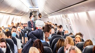 Woman Covid 19 Positive in Plane Woman Covid 19 Positive in Plane