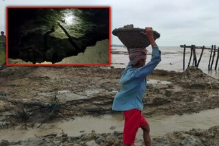 সর্বশক্তি দিয়ে নদী বাঁধ মেরামতের চেষ্টা স্থানীয়দের