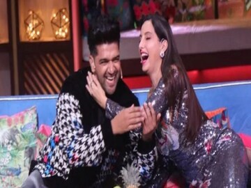 Nora Fatehi kisses Guru Randhawa