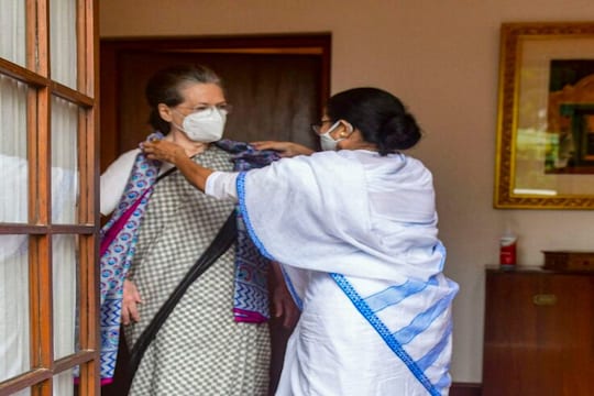 **EDS: HANDOUT PHOTO MADE AVAILABLE FROM CMO (WB) ON WEDNESDAY, JULY 28, 2021.** New Delhi: West Bengal CM Mamata Banerjee meets Congress Interim President Sonia Gandhi in New Delhi. (PTI Photo)(PTI07_28_2021_000364B)