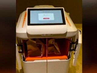 Room service robot delivers food at Winter Olympics. Photo Courtesy: Reuters