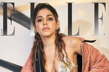 ফ্লোরাল স্যুটের ফাঁকে বক্ষবিভাজিকা, আবেদনে অপ্রতিরোধ্য পূজাকন্যার লাস্য ছবিতে