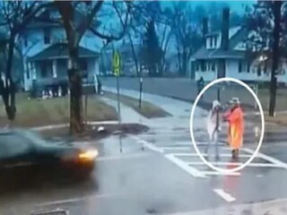 Watch: US Police Officer Pulls School Girl From In Front of Speeding car