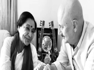 Anupam Kher with Asha Bhosle.
