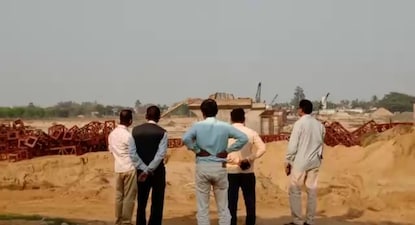সেতুর কাজ পরিদর্শনে জেলা পরিষদের সদস্যরা।