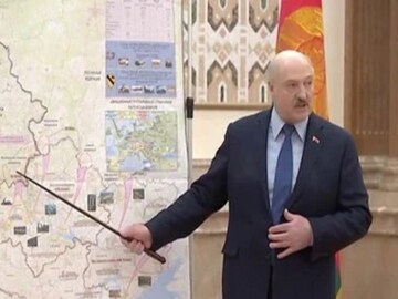 The purported image of Belarus President Alexandar Lukashenko pointing towards a map.