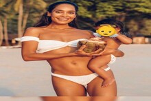 কোলে একরত্তি সন্তানকে নিয়ে লিজা! সাদা বিকিনিতে স্নিগ্ধ লুক অভিনেত্রীর