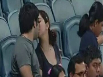 couple spotted kissing during gt vs dc match fans made the picture Viral Photo- Photo  Courtesy- Twittter 