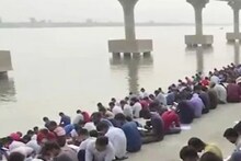 বেকারত্বের জ্বালা! গঙ্গার ঘাটে বসেই চাকরির পরীক্ষার প্রস্তুতি কয়েকশো প্রার্থীর