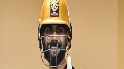 Virat Kohli Gesture- Photo Courtesy- (RCB/Twitter) Virat Kohli Gesture- Photo Courtesy- (RCB/Twitter)