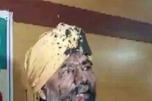 মুখে কালো কালি ছিটিয়ে আক্রমণ কৃষক নেতা রাকেশ টিকায়েতকে, আক্রমণ মাইক ছুড়ে