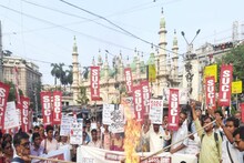 রাস্তায় জ্বলছে প্রতীকী গ্যাস সিলিন্ডার, কেন্দ্রের বিরুদ্ধে রাজপথে মিছিল