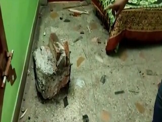বাড়ির ভিতরে ঢুকে পড়ল পাথর!