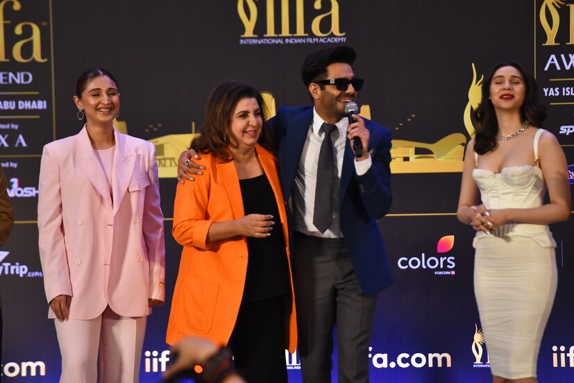 আবু ধাবিতে IIFA 2022-এর সাংবাদিক সম্মেলনে ক্যানডিড মুহূর্তে ফারহা খান আর অপারশক্তি খুরানা