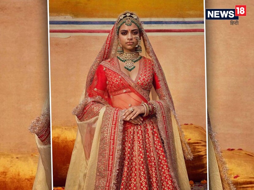 লাল রং-ও ডাস্কি মেয়েদের খুব সুন্দর দেখায়। বিয়ের জন্য একটি লেহেঙ্গা কিনতে গেলে নির্দ্বিধায়লাল রঙের লেহেঙ্গা কিনতে পারেন। কারণ লাল রং ভালবাসার রং, প্রেমের রং৷ ফলে বিয়েতে এই রং সবসময় অগ্রাধিকার পায়৷   image : Instagram/ sabyasachiofficial