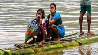 Villagers use a makeshift boat to move to a safer place from a flood-affected area following heavy rainfall in Goalpara district. (Image: News18) Villagers use a makeshift boat to move to a safer place from a flood-affected area following heavy rainfall in Goalpara district. (Image: News18)