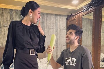 প্রকাশ্যেই সোহাগে আদরে মেতে ওঠেন করণ-তেজস্বী, দেখুন ছবি