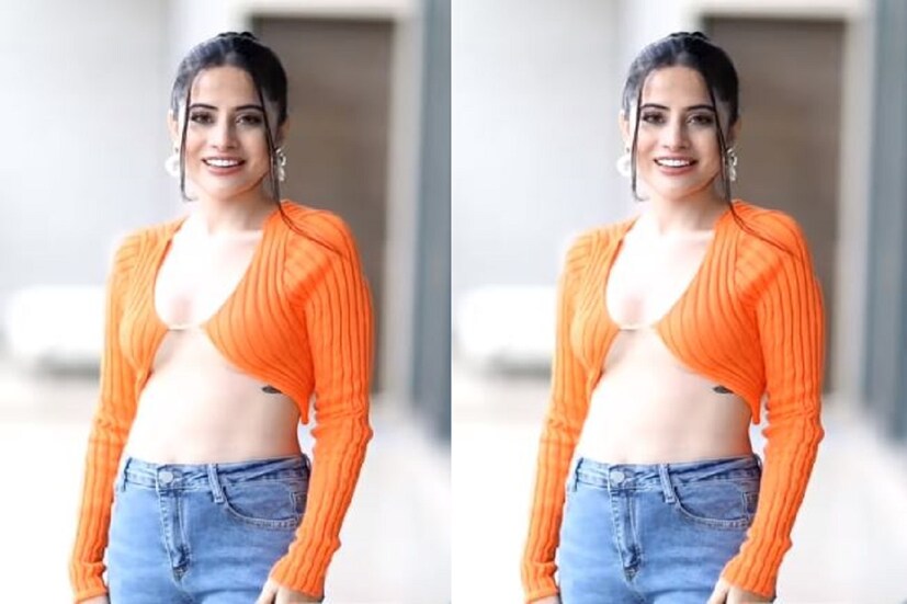 ফ্রন্ট ওপেন টপে ঝড় তুলেছেন উর্ফি জাভেদ ৷ সামনের দিকটি একটি মাত্র সুতোয় বাঁধা রয়েছে ৷ যা পাগল করেছে ভক্তদের ৷ ছবি সৌজন্যে ইনস্টাগ্রাম ৷